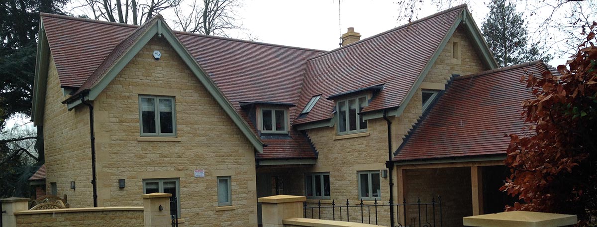 Brown Antique Rustic tiles on a self build in Glos